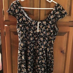 LC Black flowered, cap sleeve top.